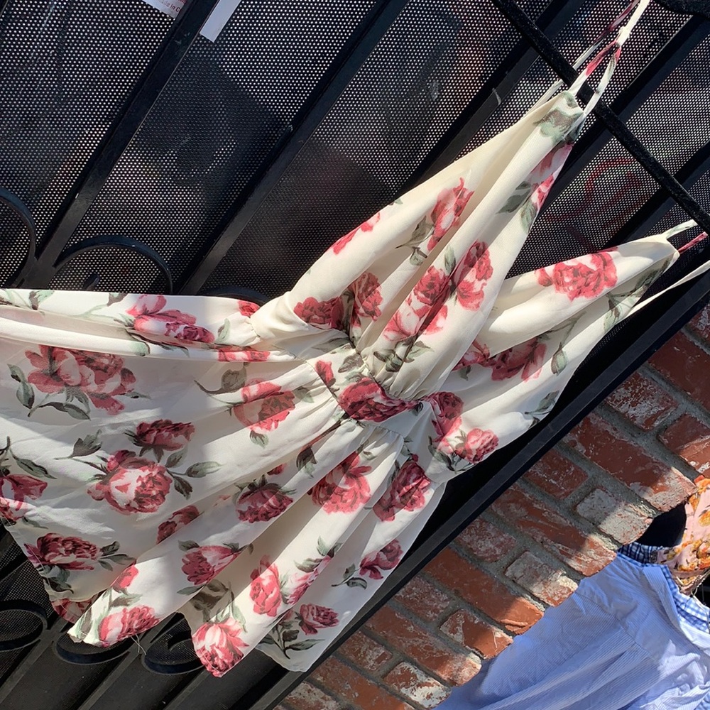 Flower romper dress, from Laura’s Boutique,